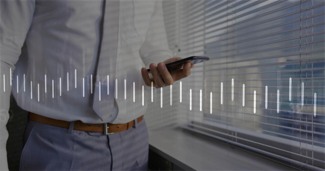 Businessman Analyzing Sound Waveform on Smartphone with Blinds Background