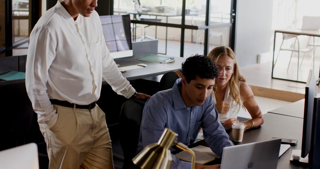 Diverse Professionals Engaged in Collaborative Office Work