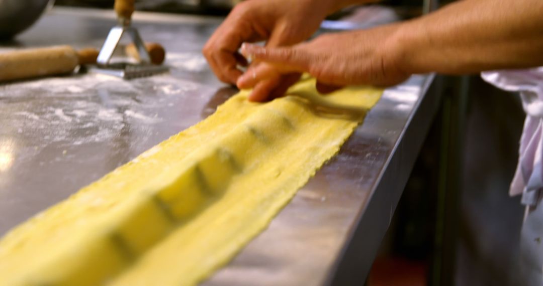 Chef preparing fresh ravioli pasta in kitchen - Free Images, Stock Photos and Pictures on Pikwizard.com