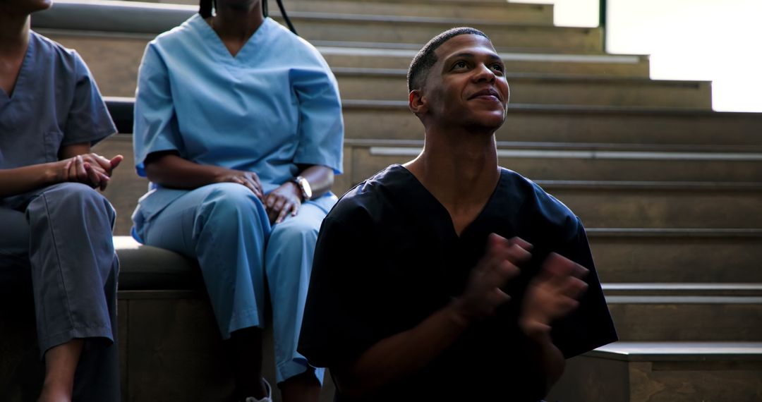 Smiling Healthcare Professional Accepting Award Applause