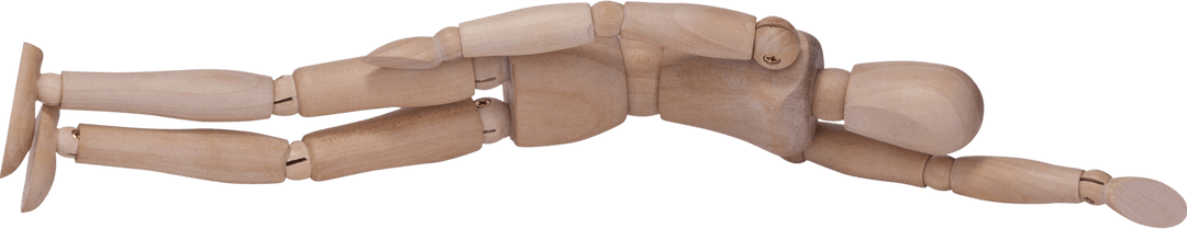 Wooden articulated figurine lying in transparent background