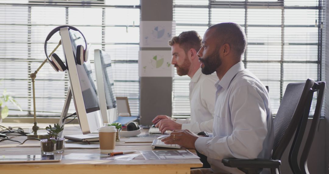 Diverse Male Colleagues Working in Modern Office Environment