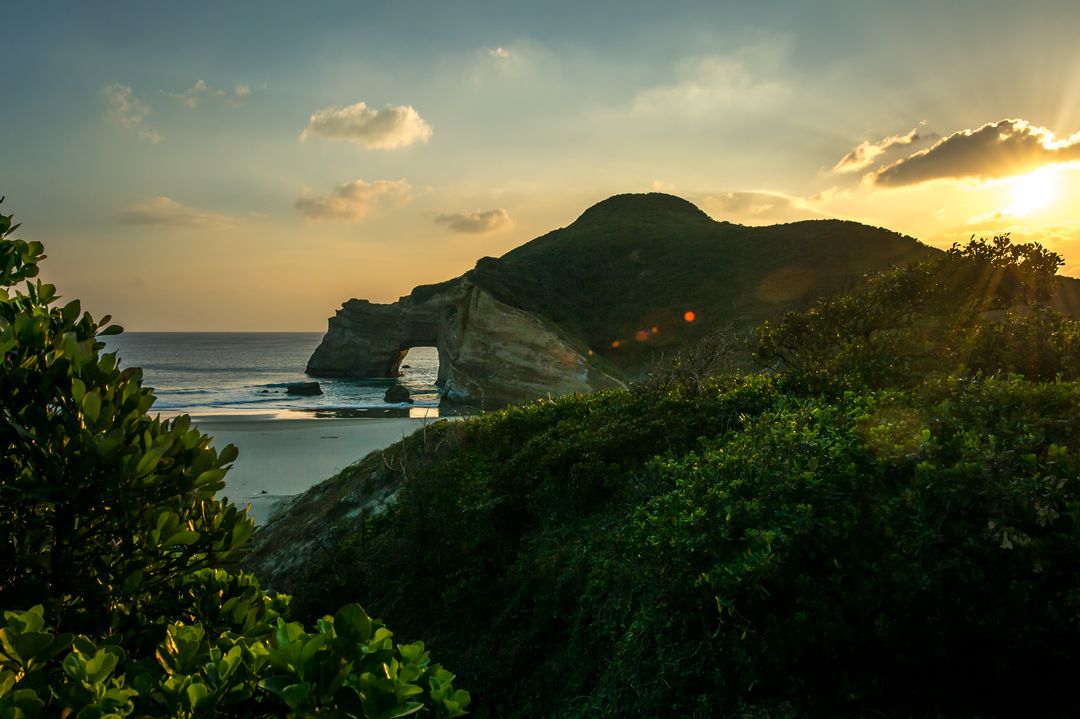 Sunset View with Arch Rock on Tanegashima Island, Japan - Free Images, Stock Photos and Pictures on Pikwizard.com