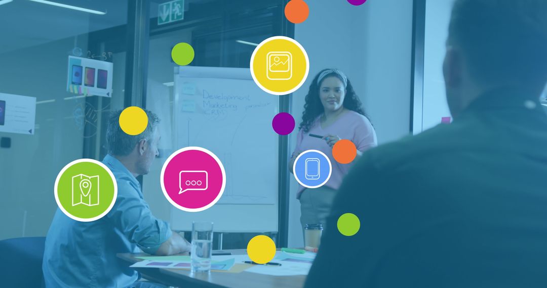 Team Collaborating in Modern Office with Social Media Graphics