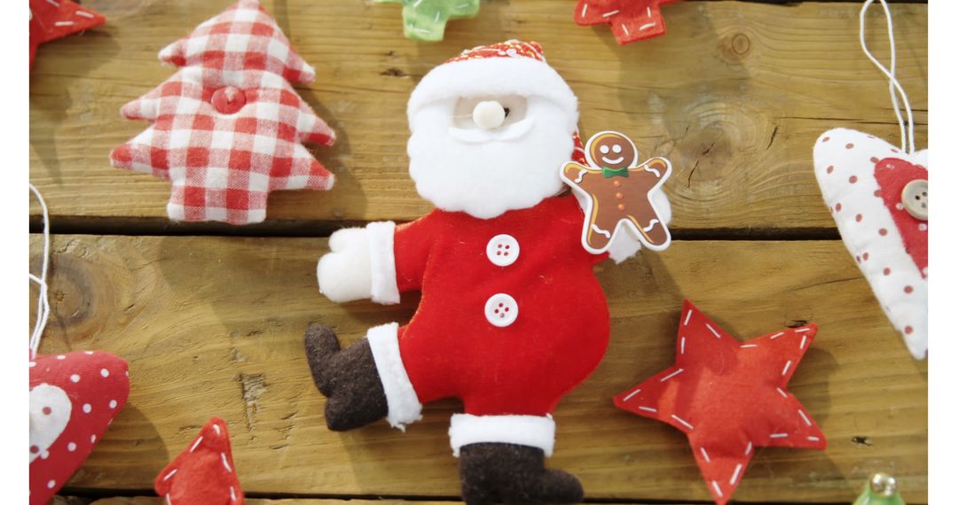 Festive Santa Decoration with Gingerbread Toy on Wooden Background - Free Images, Stock Photos and Pictures on Pikwizard.com