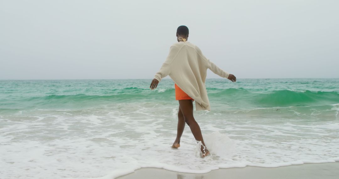 Joyful Expression at the Ocean's Edge