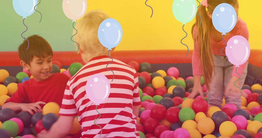 Children Enjoying Playtime in Ball Pit with Falling Balloons