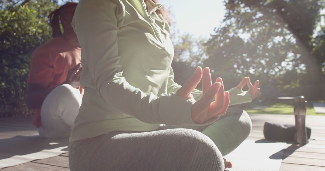 Outdoor Meditation Session in Morning Sunlight - Free Images, Stock Photos and Pictures on Pikwizard.com