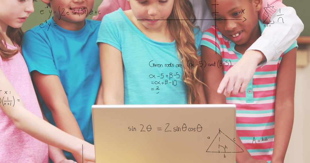 Diverse Schoolchildren Engaged With Maths on Laptop