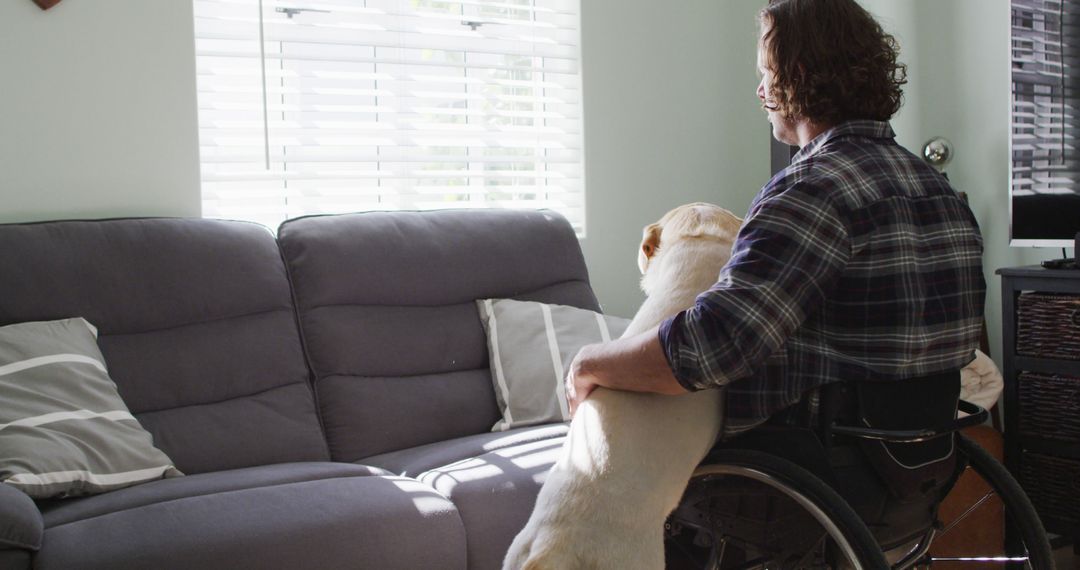 Happy Disabled Man Enjoying Time with Pet Dog at Home