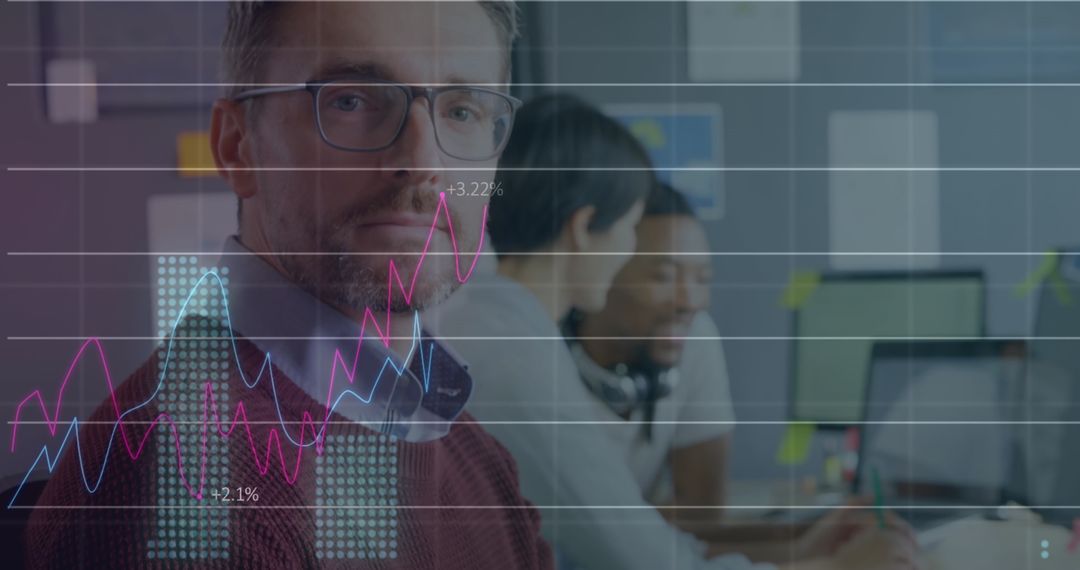 Business Team Analyzing Financial Graph with Data Overlay