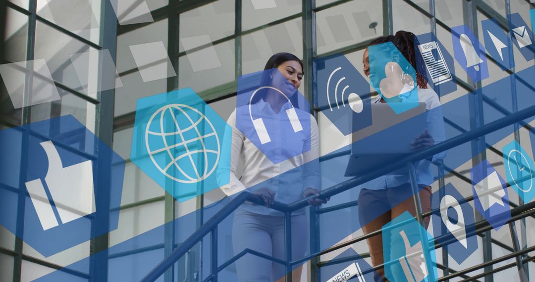 Diverse Business Women Discuss Digital Interface Concepts in Modern Office