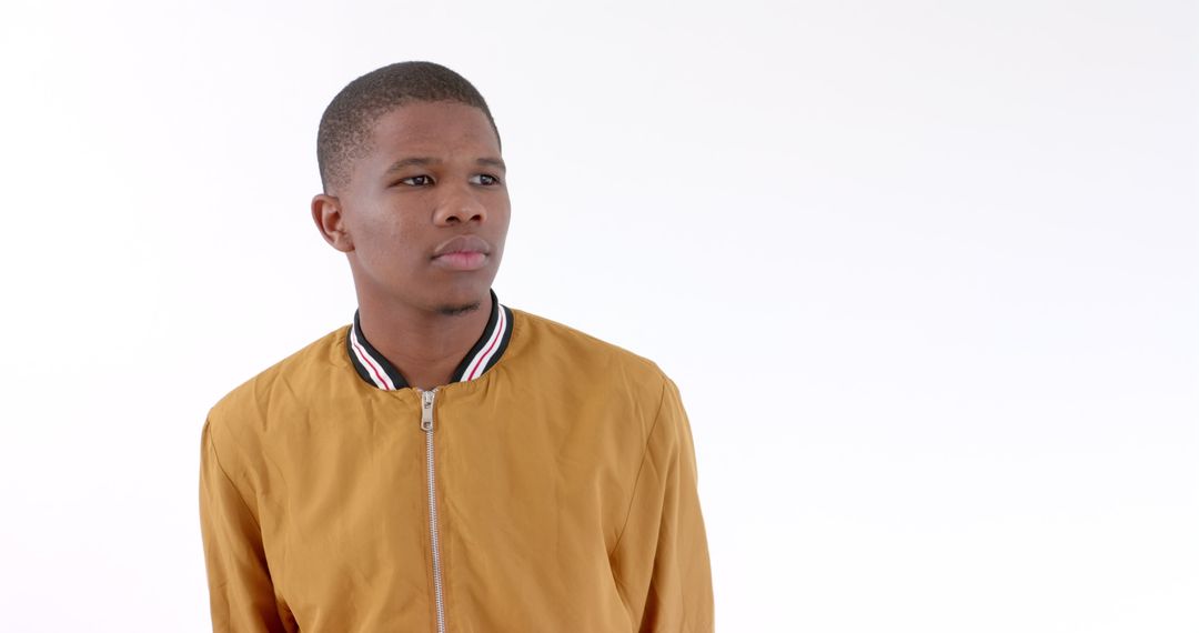 Man in Casual Jacket Contemplating Against White Background