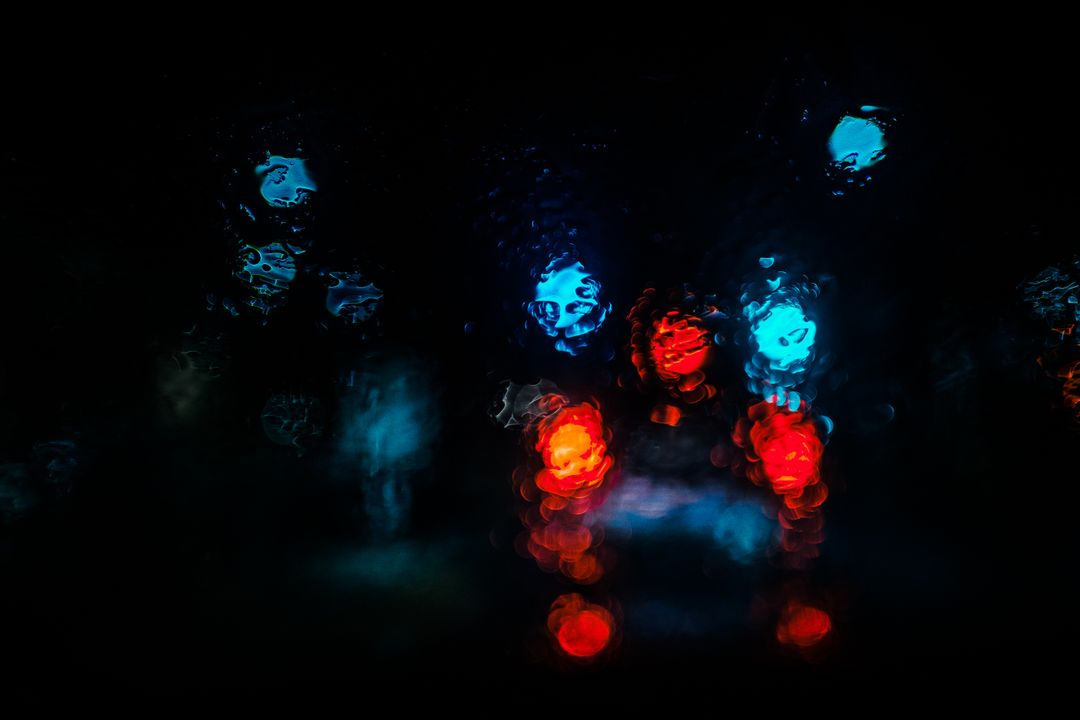 Abstract Blurry Lights Through Rainy Windshield at Night - Free Images, Stock Photos and Pictures on Pikwizard.com