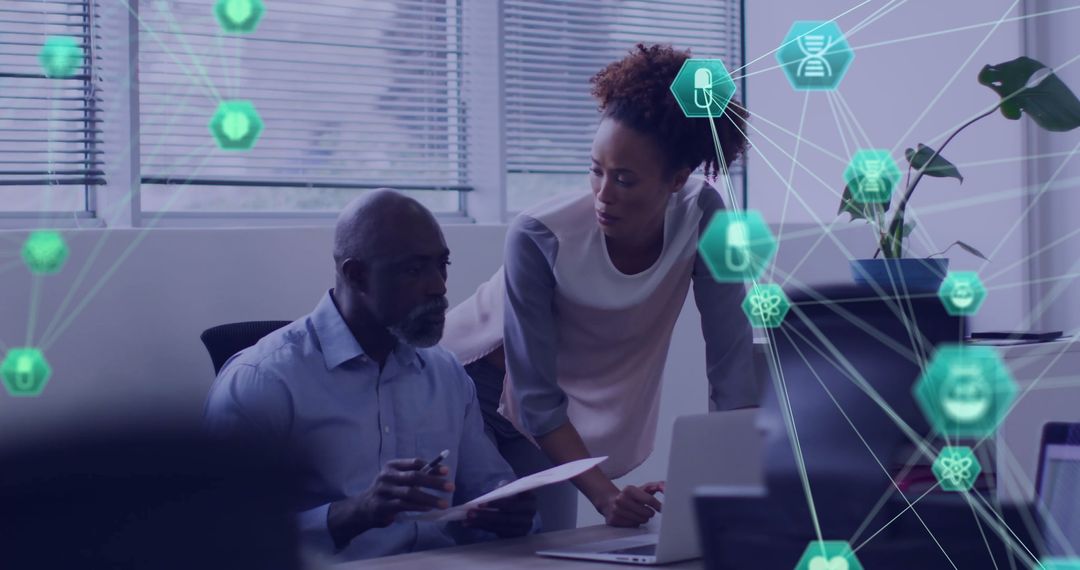 Diverse Colleagues Collaborating on Digital Interface Solutions