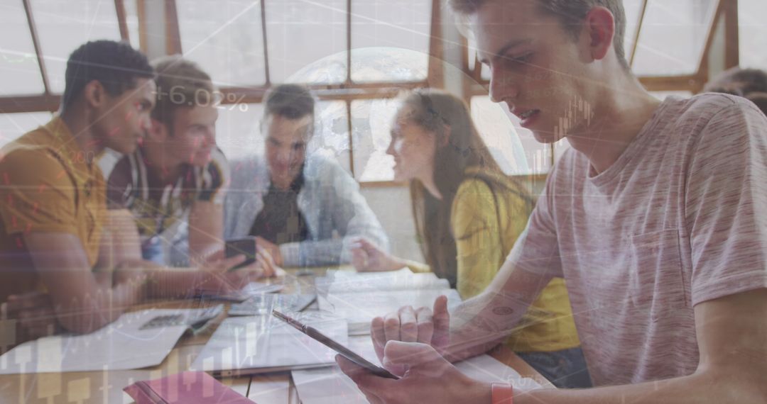 Students Engaging with Technology in Collaborative Study Session