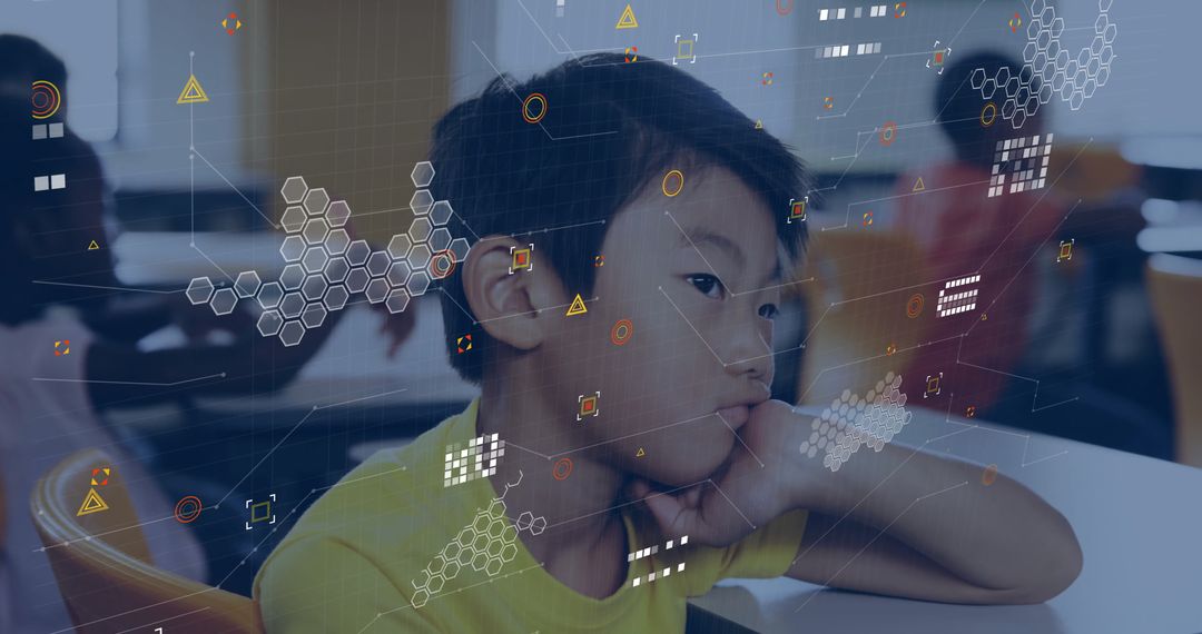 Boy Engaging with Digital Interfaces in Innovative Classroom