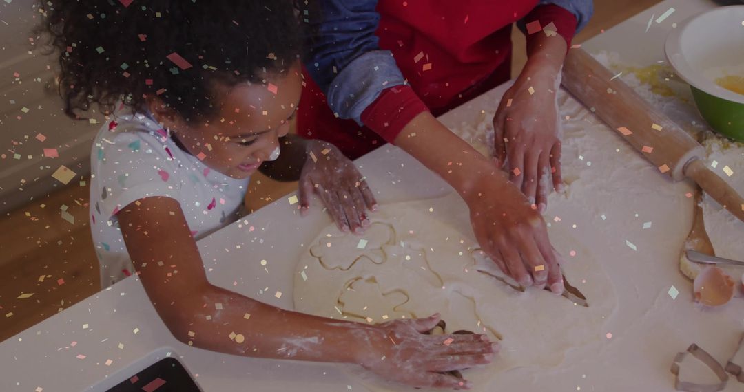 Parent and Child Crafting Star-Shaped Cookies in Home Kitchen