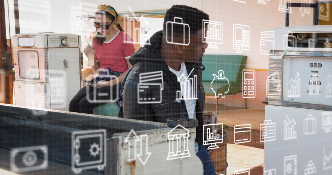 Digital Data Icons Overlay on Diverse Young Professionals in Classroom Setting
