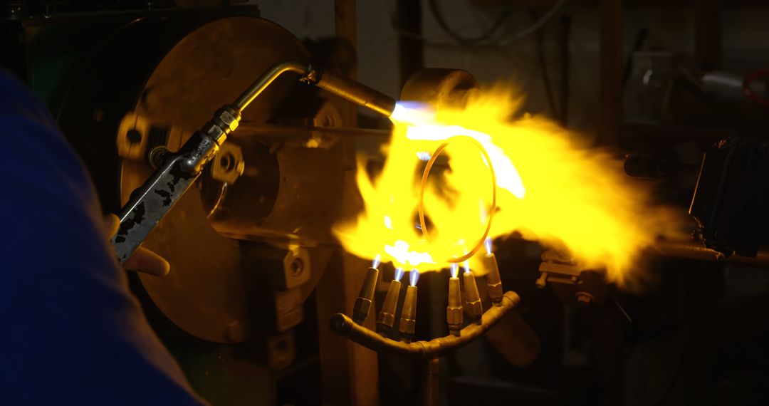 Metalworker Shaping Red Hot Steel with Industrial Torch - Free Images, Stock Photos and Pictures on Pikwizard.com