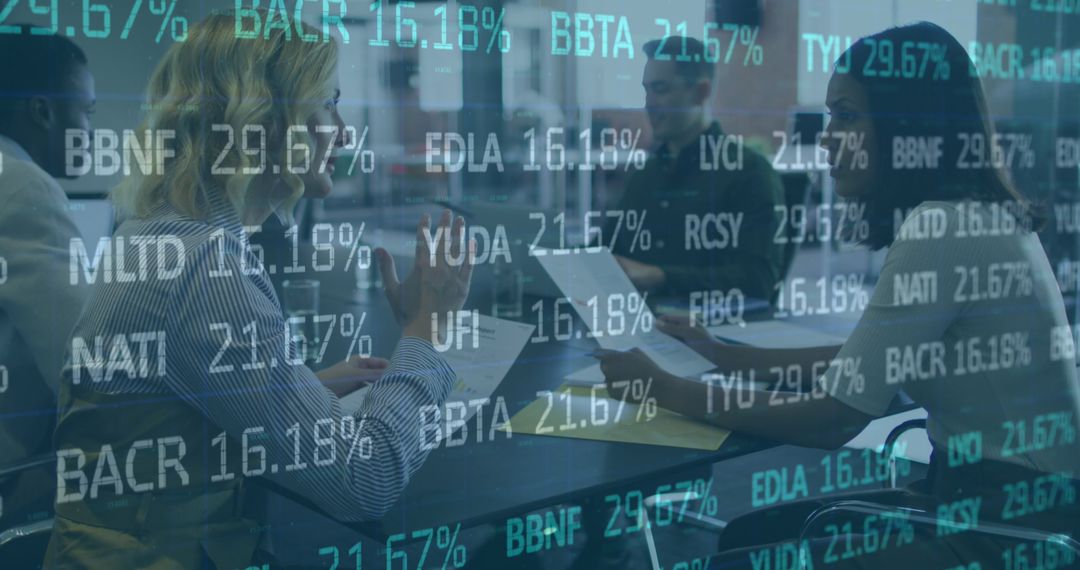 Diverse Coworkers Analyzing Stocks on Laptop in Modern Office