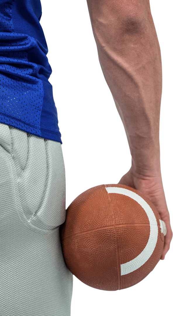 Close-Up Transparent Focus on Football in Hand by Player