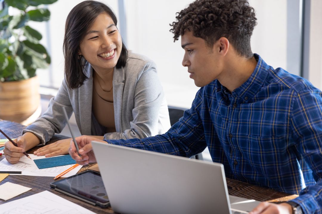 Diverse Coworkers Collaborating on Design Projects