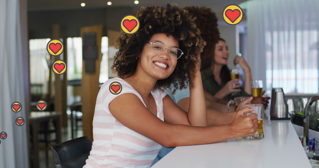 Smiling Friends Enjoying Beer with Social Media Heart Icons Overlay