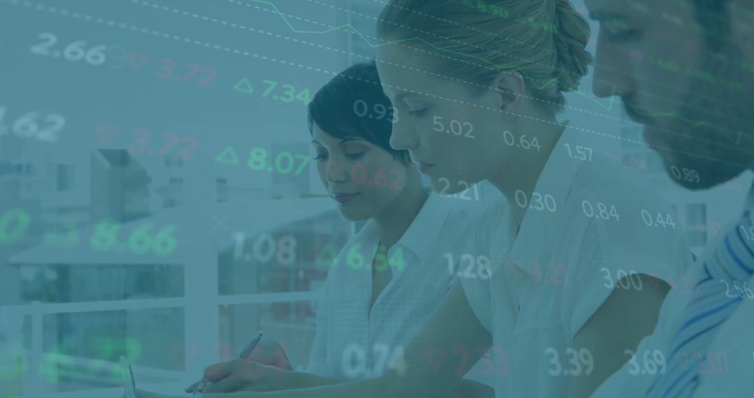 Multiracial Business Team Analyzing Financial Data