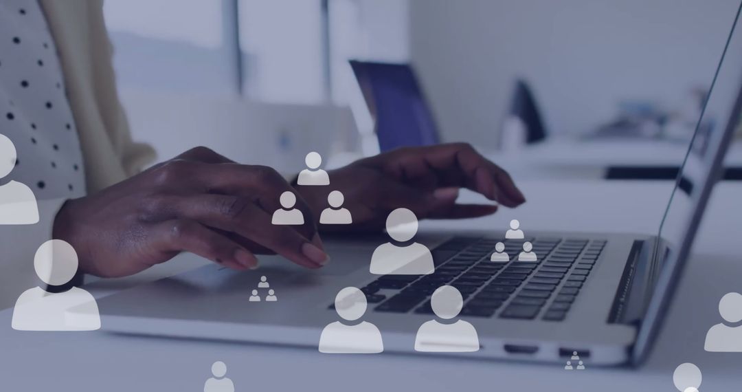 Businesswoman Processing Data on Laptop in Modern Office