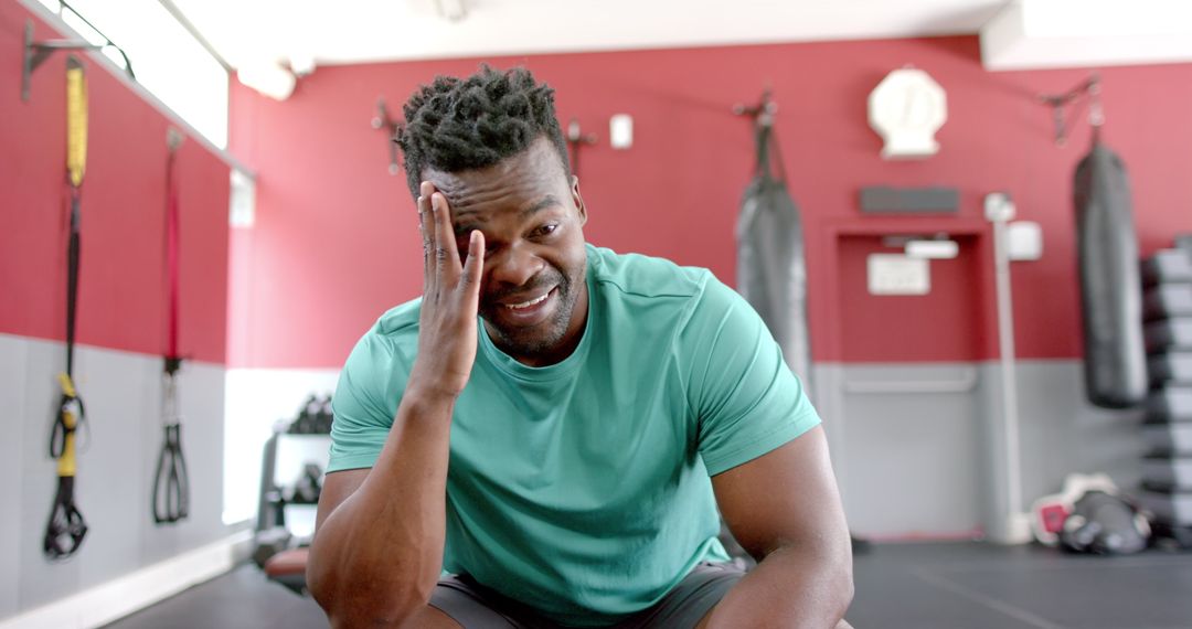 Fit African American Man Smiling Relaxing After Workout