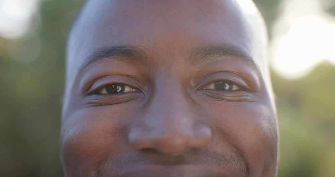 Close-up Portrait of Smiling Man Focusing on Eye Detail