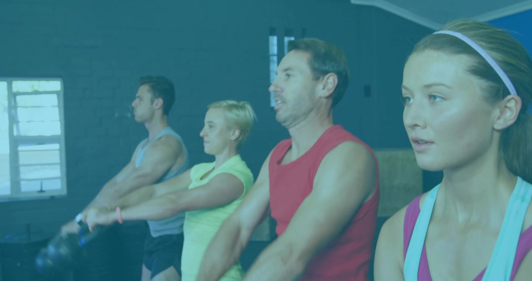 Diverse Group Training with Kettlebells in Gym