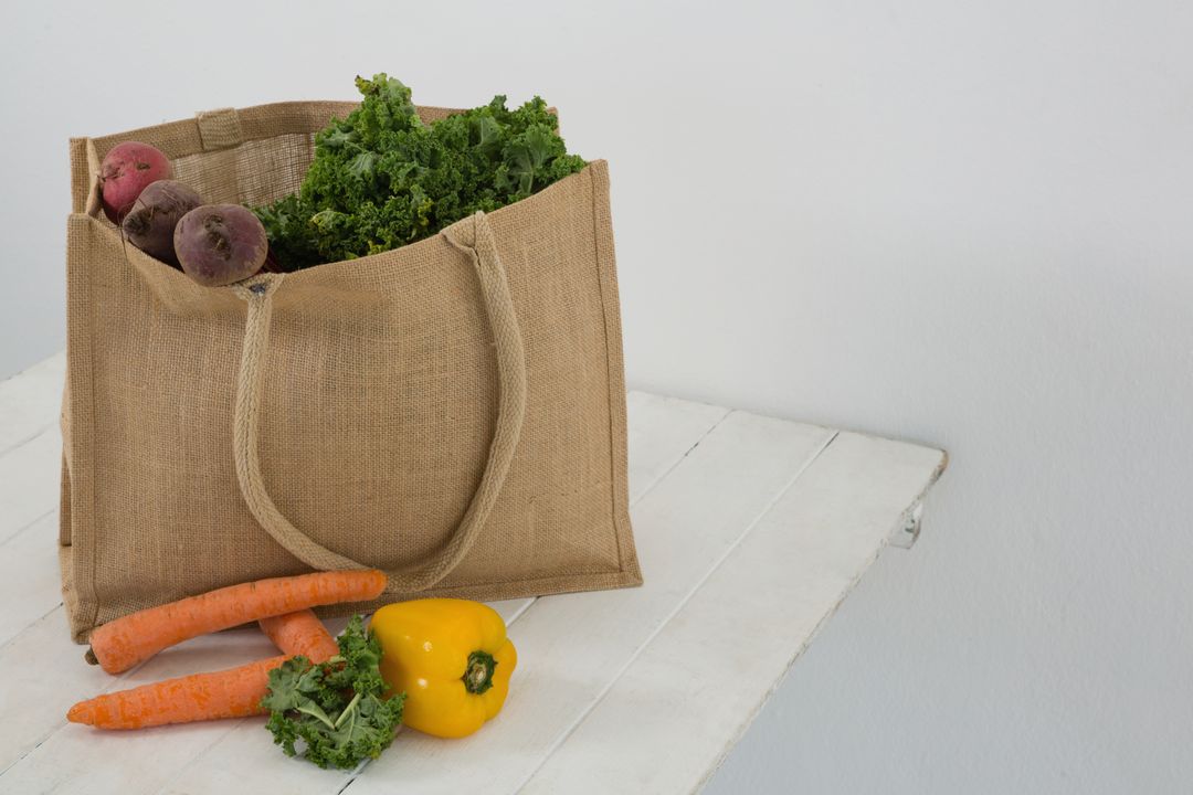 Eco-Friendly Grocery Bag with Fresh Vegetables on Table - Free Images, Stock Photos and Pictures on Pikwizard.com
