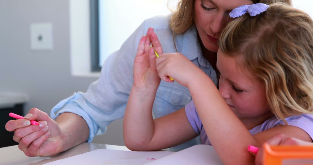 Mother Helping Daughter with Coloring - Free Images, Stock Photos and Pictures on Pikwizard.com