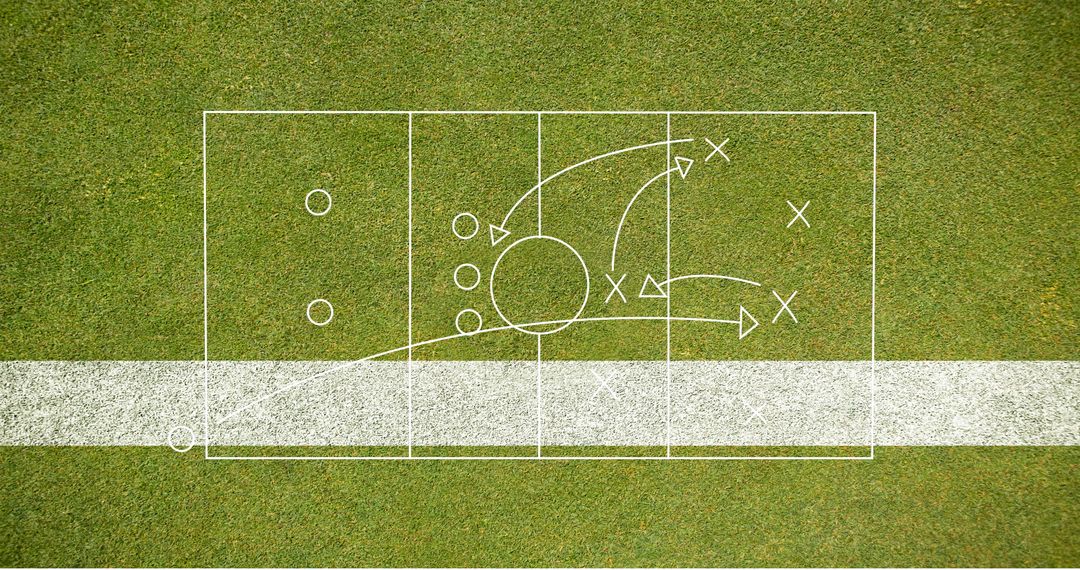 Soccer Playbook Diagram on Grassy Field Showing Game Strategy