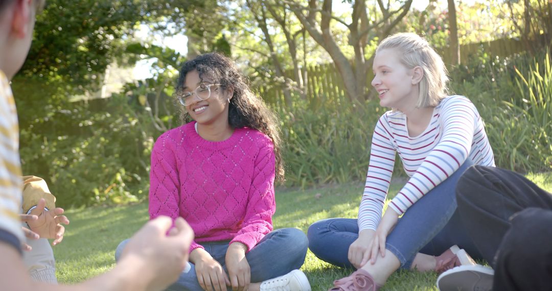 Multiracial Friends Hanging Out in Sunny Park - Free Images, Stock Photos and Pictures on Pikwizard.com