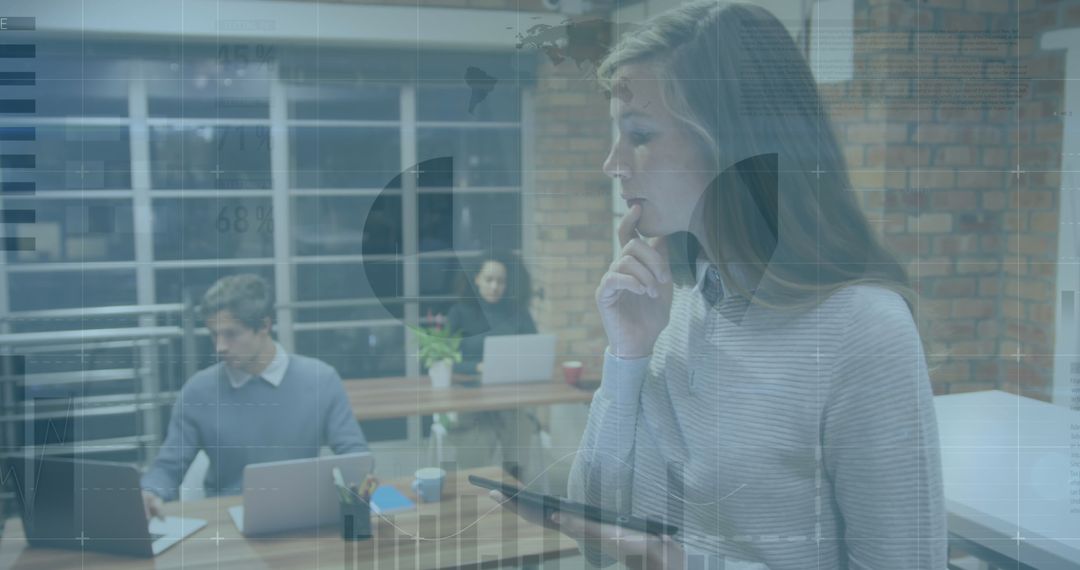 Mixed Professionals Analyzing Financial Data in Modern Office