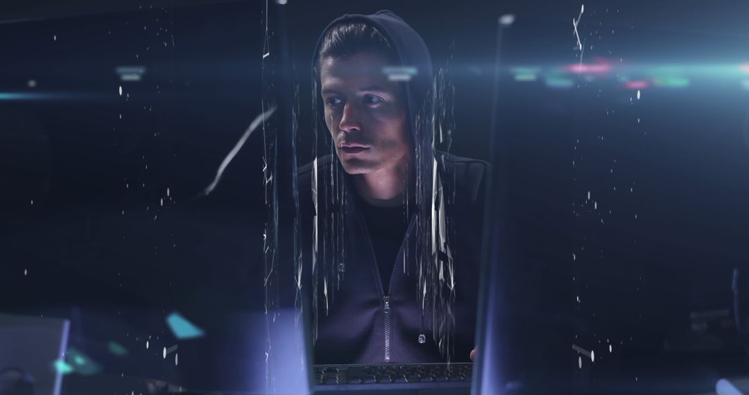 Male Hacker Engaging in Intense Digital Interface Distortion