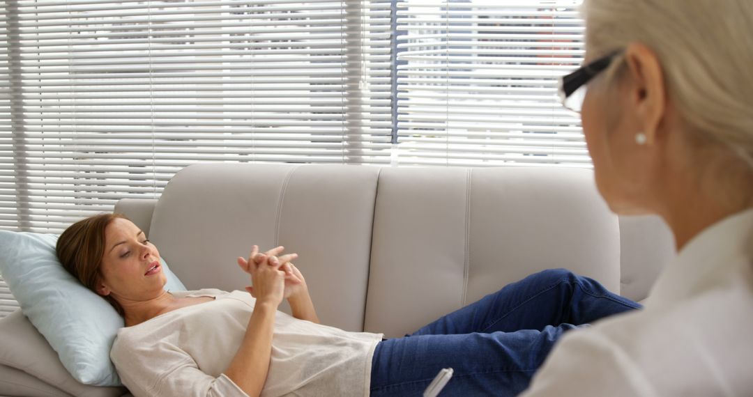 Woman Relaxing on Couch During Therapy Session - Free Images, Stock Photos and Pictures on Pikwizard.com