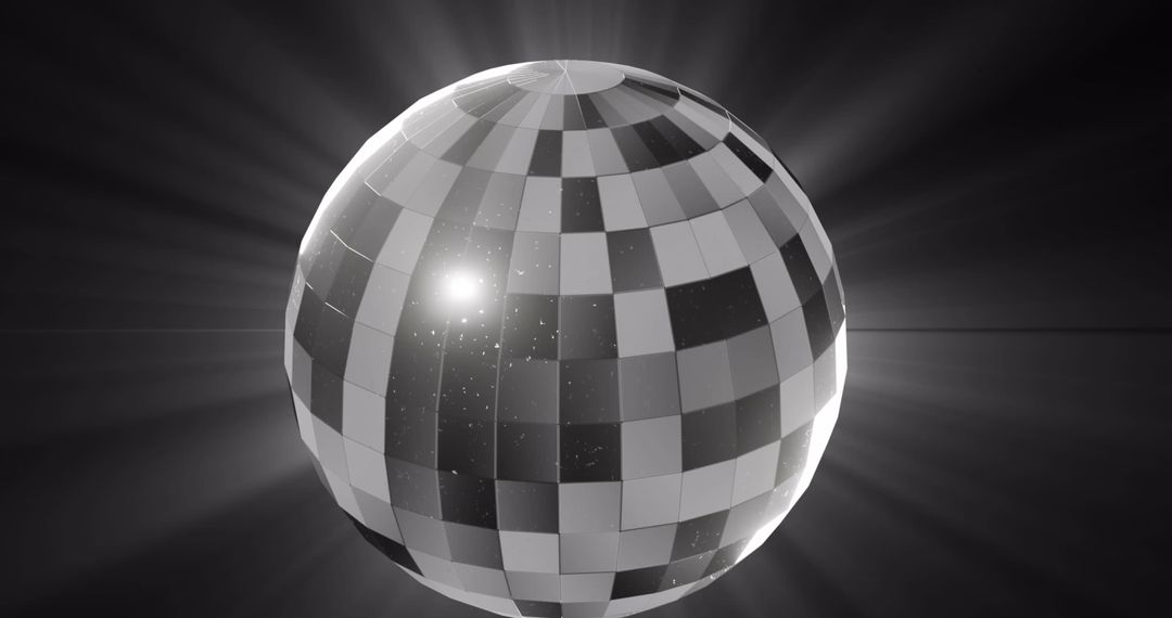 Monochrome Mirrorball Glowing Against Dark Background - Free Images, Stock Photos and Pictures on Pikwizard.com