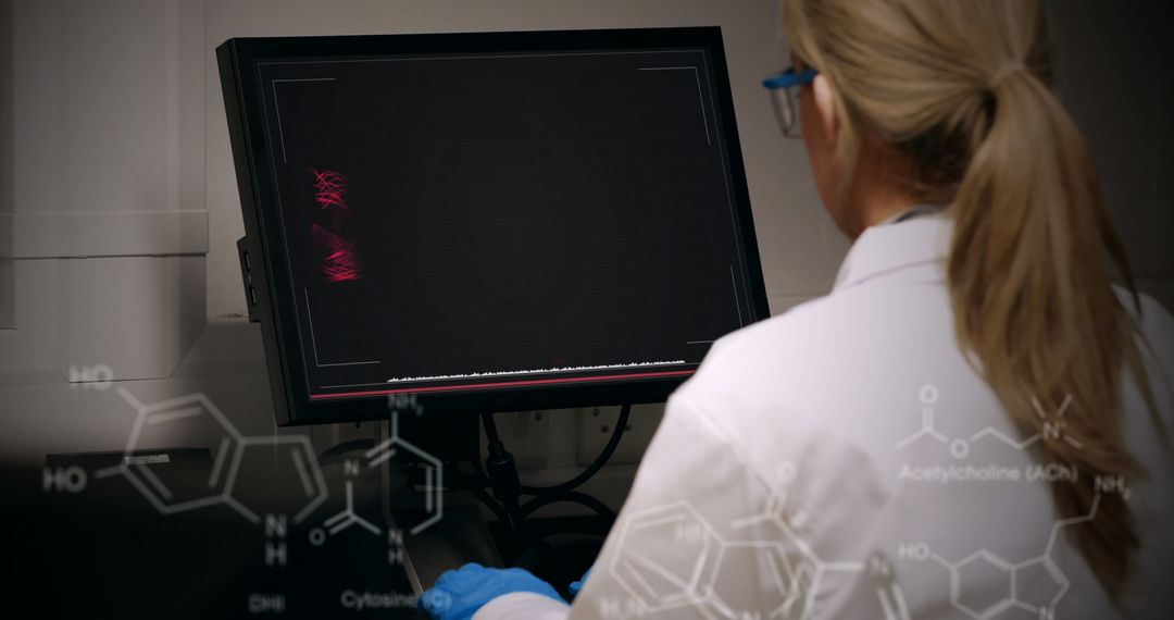 Female Scientist Analyzing Data on Computer with Chemical Formulas - Free Images, Stock Photos and Pictures on Pikwizard.com