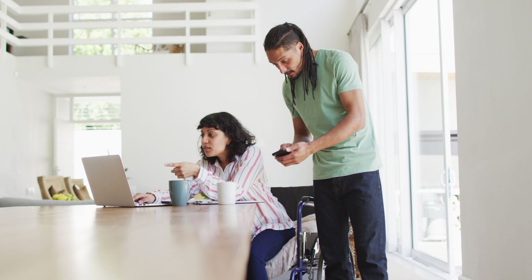 Inclusive Couple Using Technology at Home