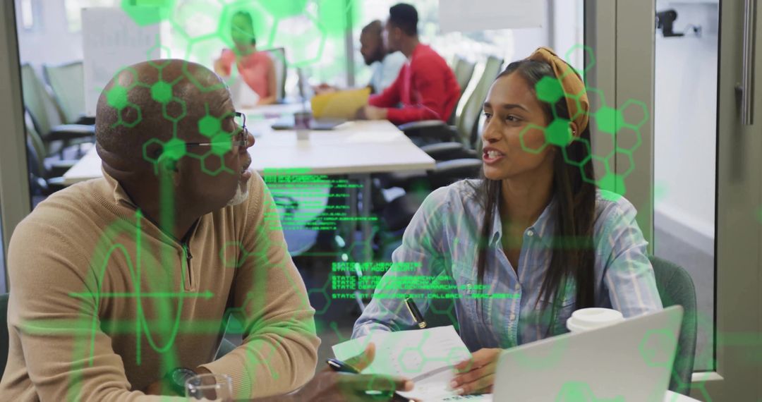 Diverse Team Collaborating in Tech Office with Virtual Overlay