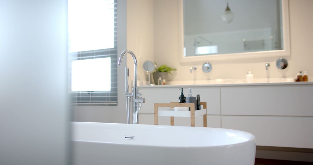 Modern Bathroom with Large Bathtub and Minimalist Decor - Free Images, Stock Photos and Pictures on Pikwizard.com