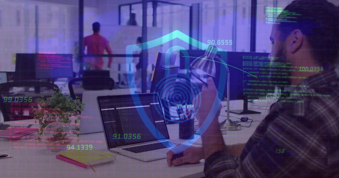 Developer Reviewing Code with Digital Security Interface in Office