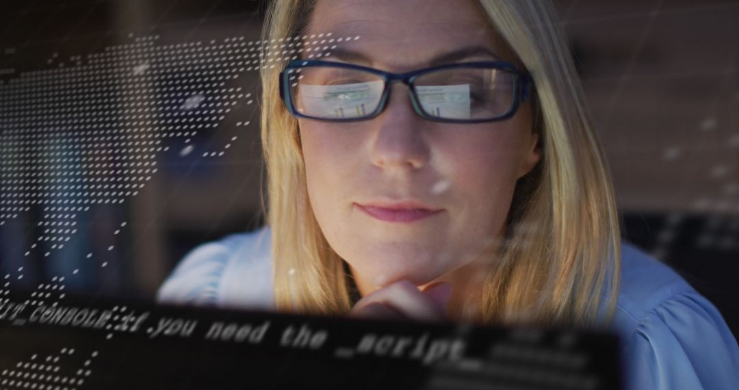 Businesswoman Analyzing Digital Financial Data on Computer