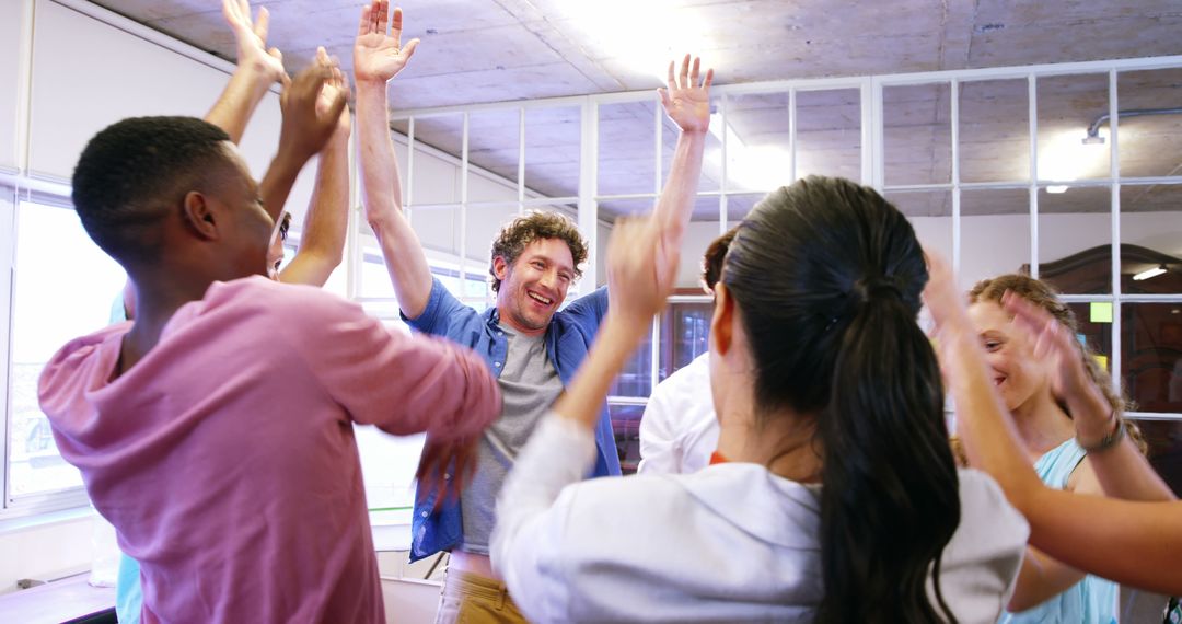 Team-Building Success Celebration in Office Environment