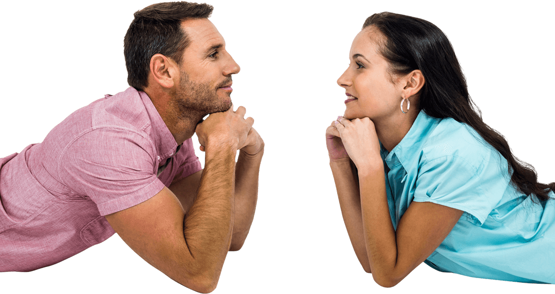Happy Couple Smiling While Lying on Transparent Floor