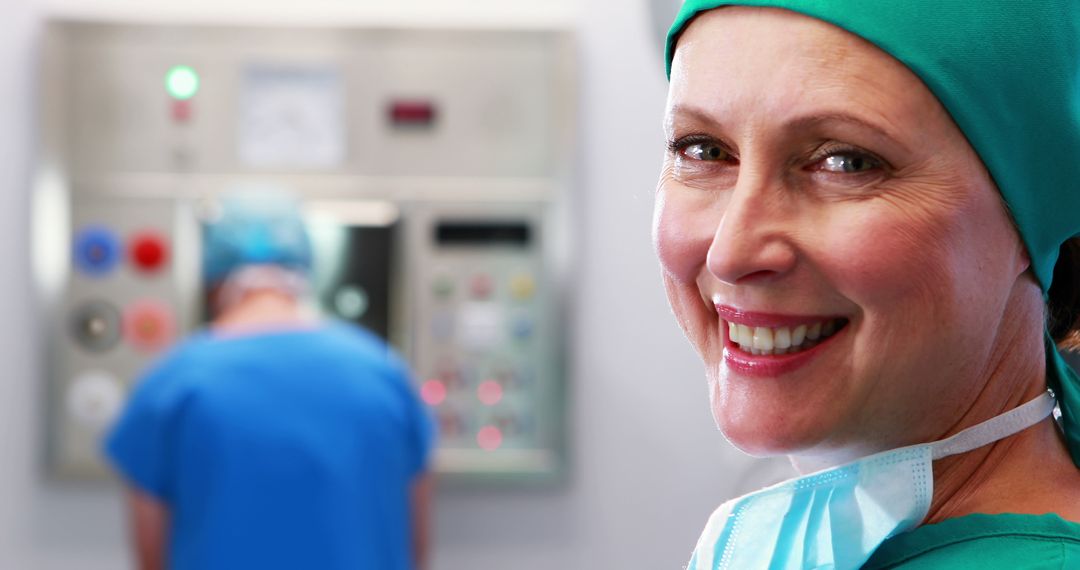 Smiling Female Surgeon in Operating Room Wearing Scrubs - Free Images, Stock Photos and Pictures on Pikwizard.com